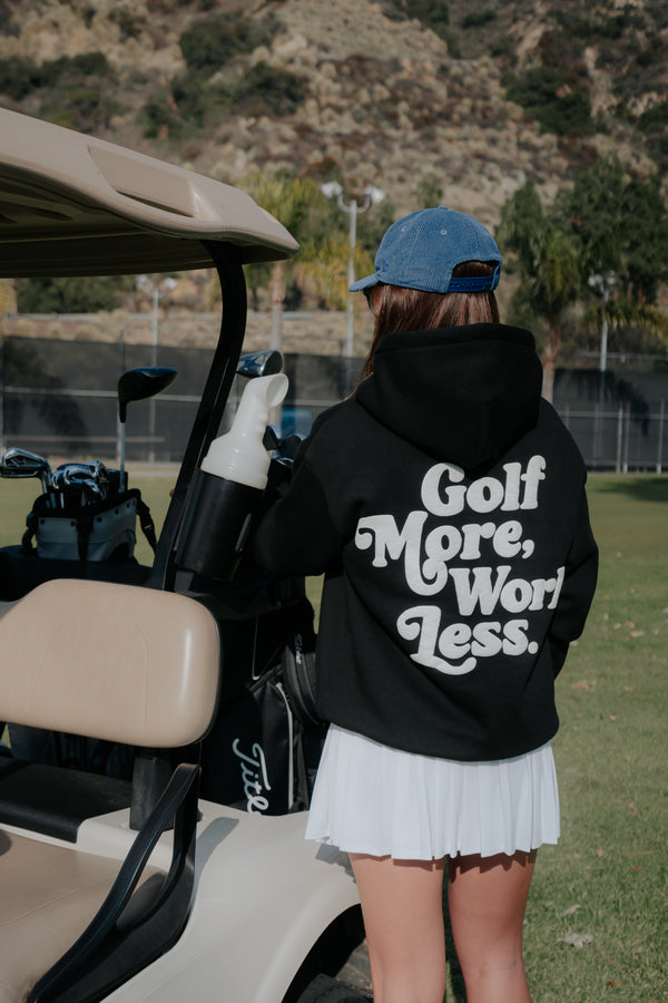 Golf After 5 "Golf More, Work Less" unisex black hoodie, back view, female model